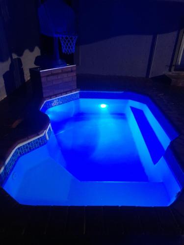 Bazén v ubytování Cozy guesthouse springs nebo v jeho okolí