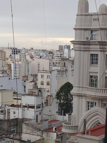 a view of a city with a white building at Hermoso Apartamento en el centro de Buenos Aires. in Buenos Aires