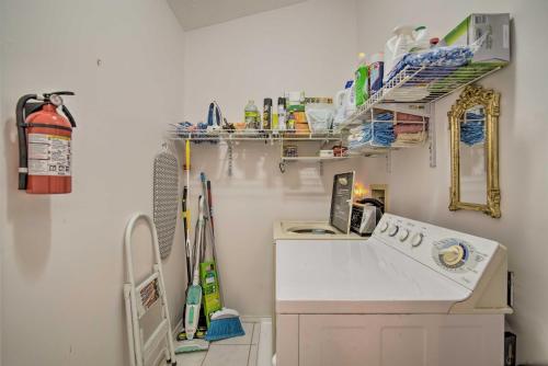 a kitchen with a white stove and a sink at Canal-Front Retreat in Crystal River! in Crystal River