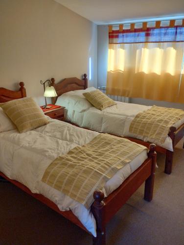 Voodi või voodid majutusasutuse La Comarca Aparts toas