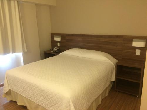 Katil atau katil-katil dalam bilik di Mogano Business Hotel- ELETROPOSTO