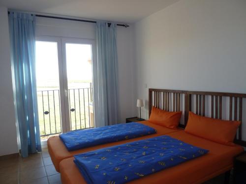 Postel nebo postele na pokoji v ubytování Hostal Moratinos