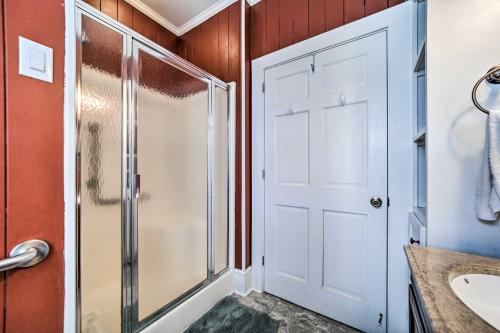 a bathroom with a shower and a sink at Quaint Home with Porch in Downtown Waynesville! in Waynesville