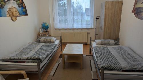 Postel nebo postele na pokoji v ubytování Ferienwohnung Randowtal-Schmölln