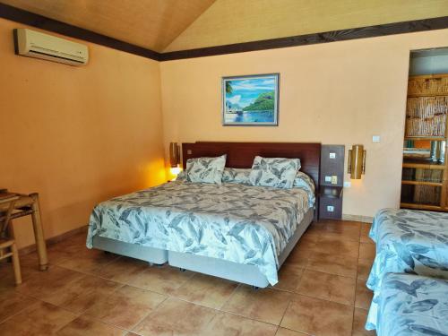Katil atau katil-katil dalam bilik di Hotel Kaveka