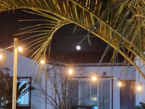 a group of street lights in front of a building at Gla Aewol in Jeju