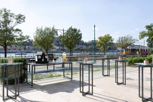 a group of tables with candles on them in a park at Budapest Marriott Hotel in Budapest
