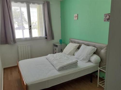 Postel nebo postele na pokoji v ubytování Appartement Saint-Hilaire-de-Riez, 2 pièces, 4 personnes - FR-1-324A-22