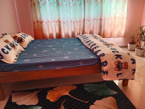 Postel nebo postele na pokoji v ubytování REMA HOMESTAY