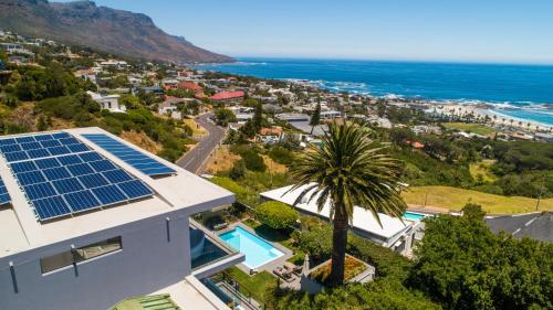 an aerial view of a house with solar panels on the roof at Atholl House in Cape Town