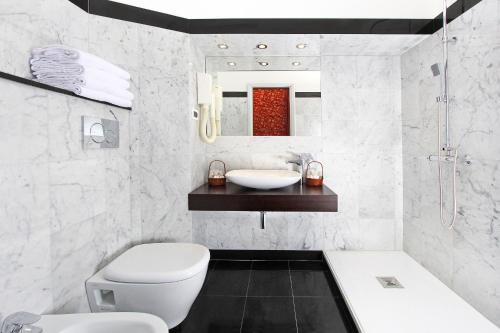 Koupelna v ubytování Hotel Arcangelo