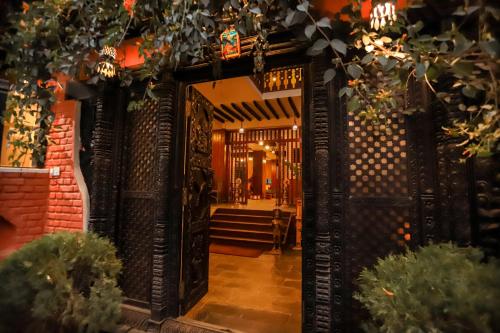 an entrance to a building with an open door at Nivas Boutique Home in Kathmandu