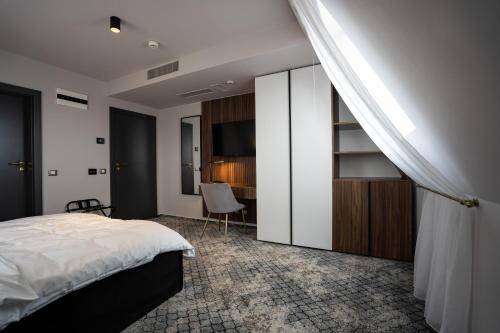 Postel nebo postele na pokoji v ubytování Hotel Cristal