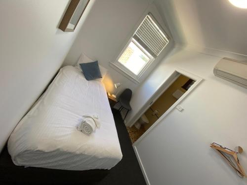 Katil atau katil-katil dalam bilik di Central Motel Mudgee