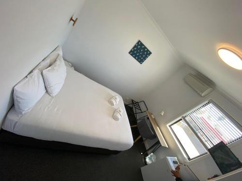 Katil atau katil-katil dalam bilik di Central Motel Mudgee