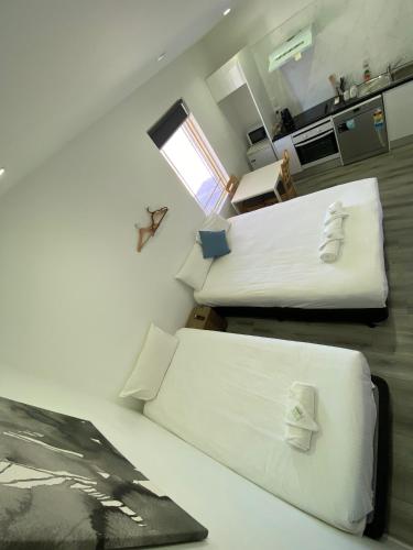 Katil atau katil-katil dalam bilik di Central Motel Mudgee
