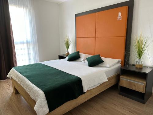 Postel nebo postele na pokoji v ubytování Business Hotel Prijedor