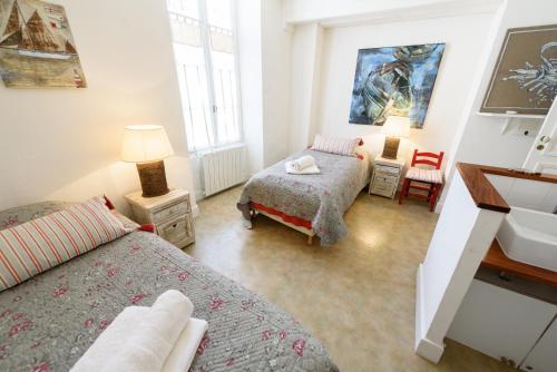 Ένα ή περισσότερα κρεβάτια σε δωμάτιο στο Villa Le Passe simple
