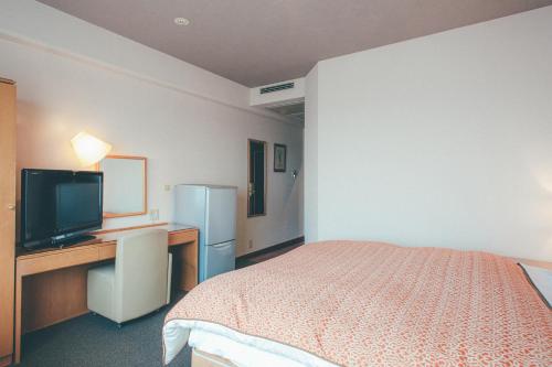 Televisyen dan/atau pusat hiburan di Hotel Villa Kuretake