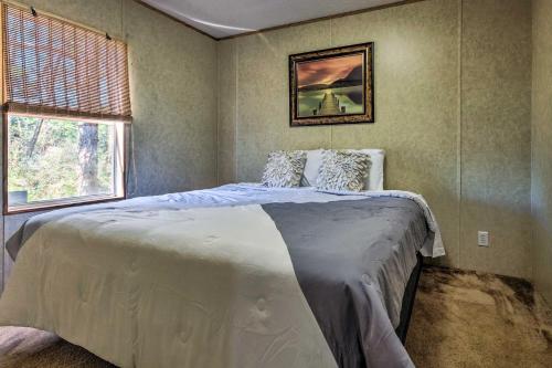 a bedroom with a large bed in a room at Cozy Gulf Breeze Home, 3 Mi to East Bay! in Navarre
