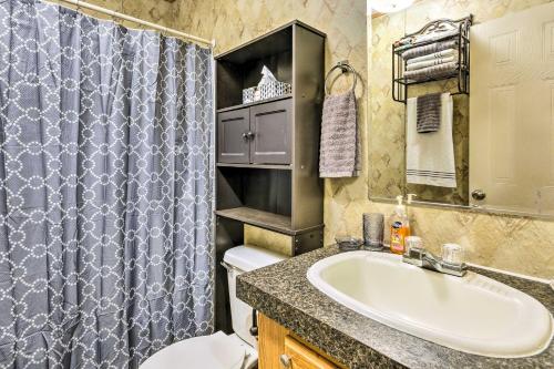 a bathroom with a sink and a toilet and a shower at Cozy Gulf Breeze Home, 3 Mi to East Bay! in Navarre