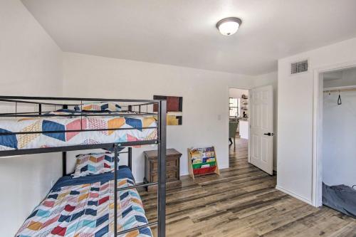 a bedroom with two bunk beds and a hallway at Rural Gilmer House with Covered Patio! in Gilmer