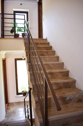 a staircase in a house with a window at Anna Home B&B in Areni