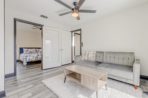 a living room with a couch and a table at Paradise Dream Vacations #1 in Indialantic