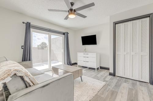 a living room with a couch and a ceiling fan at Paradise Dream Vacations #1 in Indialantic