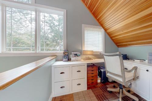 a home office with a desk and a chair at The Apartment at Camp Hattie Wolfeboro in Wolfeboro