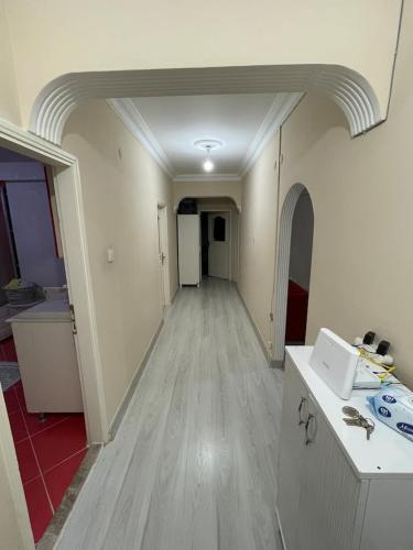 an empty room with a hallway with a kitchen and a hallway at Private Room in Istanbul #76 in Istanbul