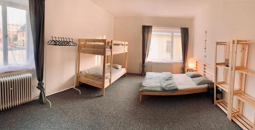 Postel nebo postele na pokoji v ubytování Apartmány Horní Blatná