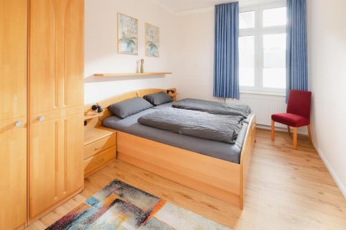 Postel nebo postele na pokoji v ubytování Villa Marie Wohnung 2, Norderney