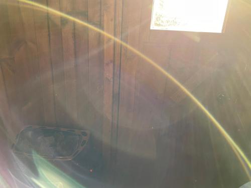 a close up of a tub in a wooden wall at Pause Cachée in Walhain-Saint-Paul