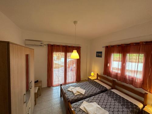 Ένα ή περισσότερα κρεβάτια σε δωμάτιο στο APARTMENTS 4 YOU