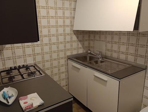 Kuchyň nebo kuchyňský kout v ubytování Biogarden
