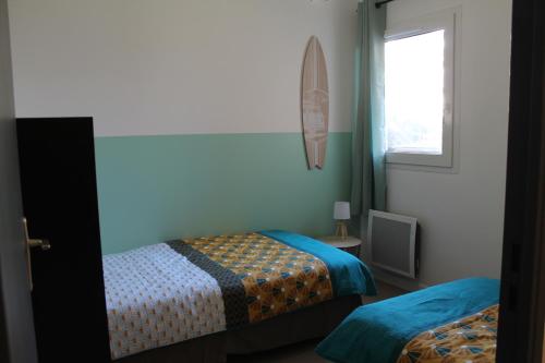 Posteľ alebo postele v izbe v ubytovaní Location Ajaccio