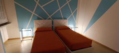 Casa Sant'Antonio tesisinde bir odada yatak veya yataklar