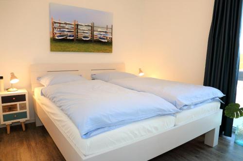 Postel nebo postele na pokoji v ubytování 48 1 N Waterkant