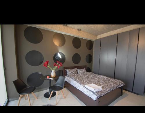 Een bed of bedden in een kamer bij Villa Residence Apartment