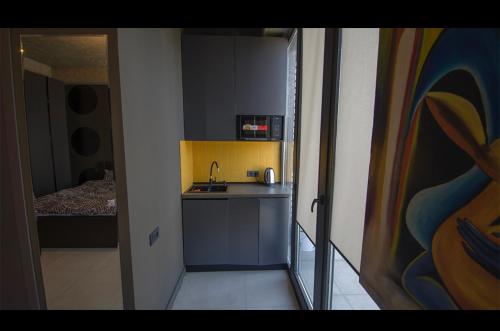 Een keuken of kitchenette bij Villa Residence Apartment