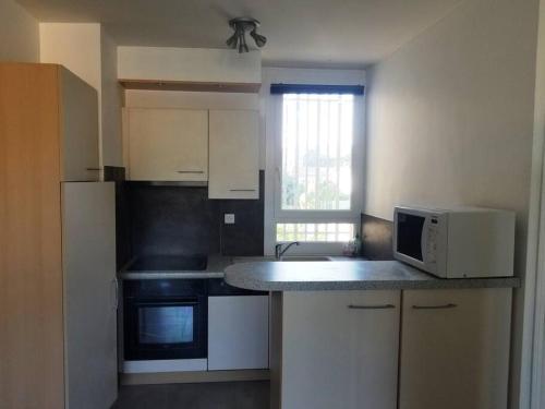 Photo de la galerie de l'établissement Le Sof Paradis Grand T2 sur la plage des Lecques, à Saint-Cyr-sur-Mer