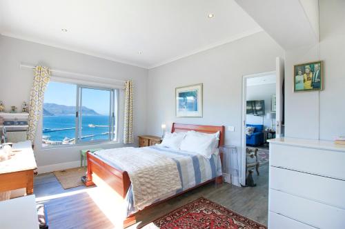 Ένα ή περισσότερα κρεβάτια σε δωμάτιο στο The Captains Penthouse