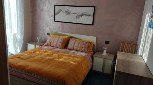 En eller flere senger på et rom på Casa di Zuzzi