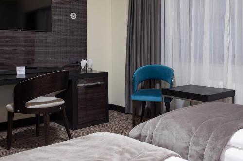 Old Town Hotelにあるベッド