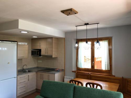 Kuchyň nebo kuchyňský kout v ubytování Apartamentos Ca de Marti