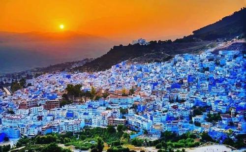 a view of the blue city at sunset at Dar Casa Plasa Grande in Chefchaouene