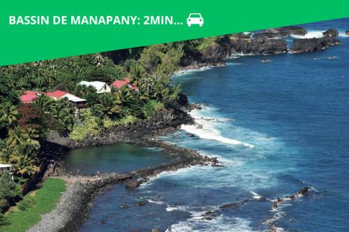 an aerial view of the ocean with a green background at Magnifique villa avec jacuzzi Proximité mer in Saint-Joseph