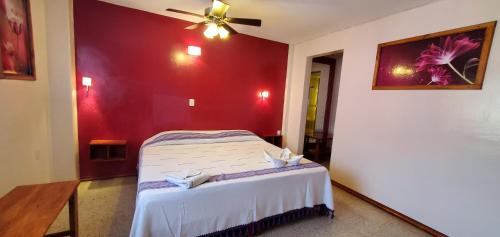 Кровать или кровати в номере Hotel Florida Oaxaca