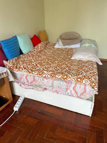 Postel nebo postele na pokoji v ubytování Cozy room with balcony